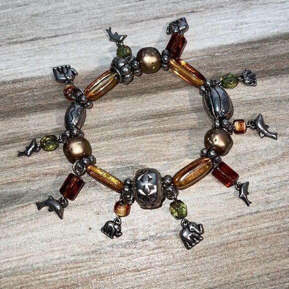 Bracelet woman’s OSFM elephant and dolphin stretch bracelet silver tone & amber - Picture 1 of 8